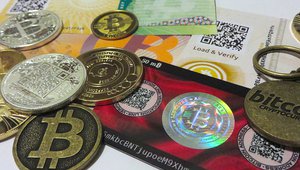 Respatialization of currency: Cryptocurrencies & mesh networks